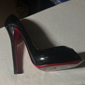 Wild Eye Designs wine holder red bottom heel